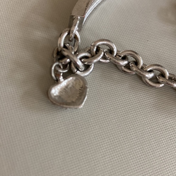 Crystal rhinestone bracelet with heart encrusted rhinestone hang charm. - Picture 4 of 5